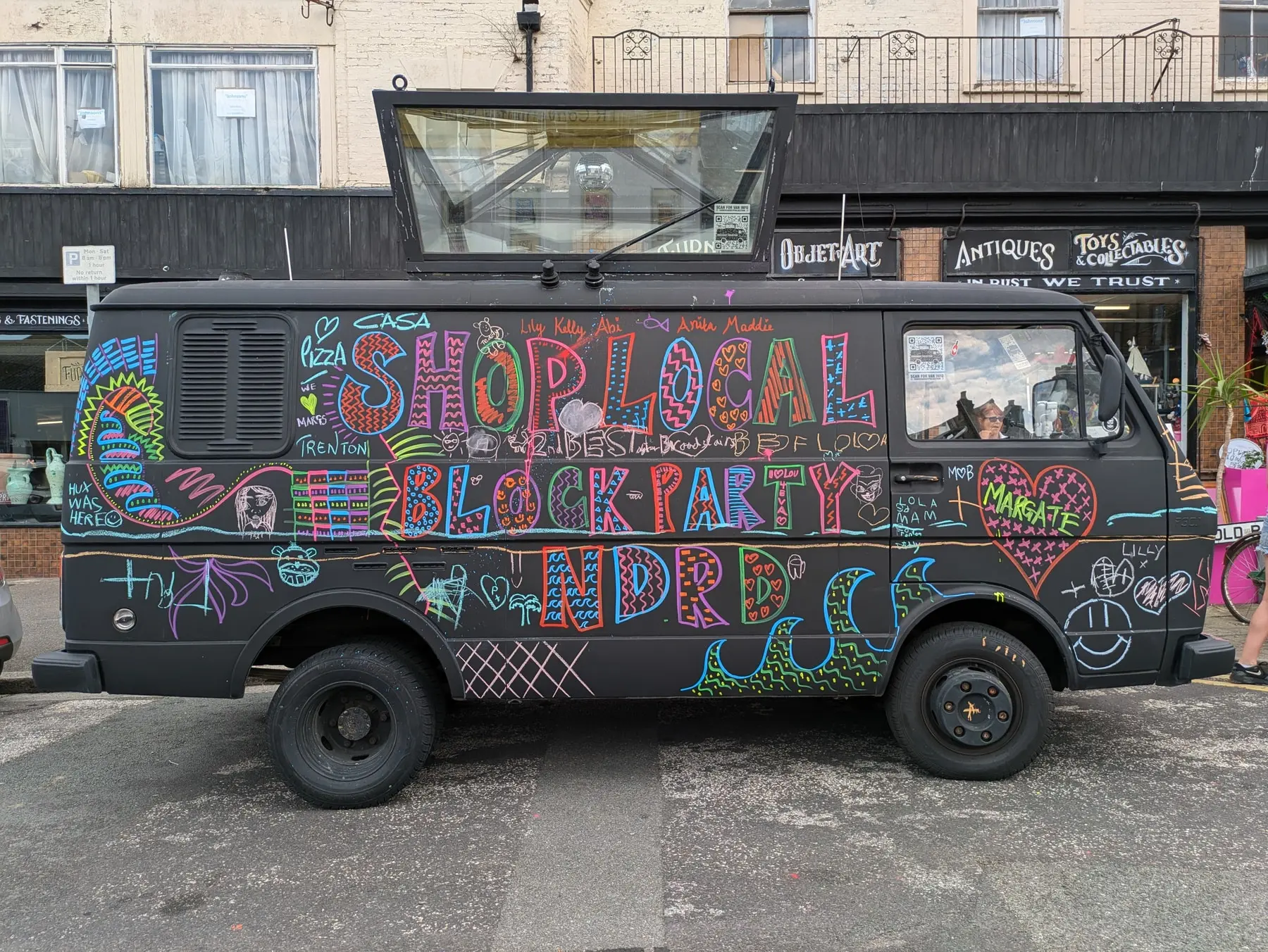 Hand-painted "Shop Local" sign on a van in Thanet